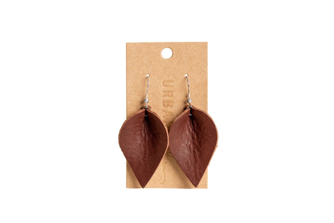 Urban Southerns Everyday Earrings are brown, leaf-shaped leather earrings with a lightweight design and bronze-plated hooks, displayed on a plain brown card with a small hanging hole.