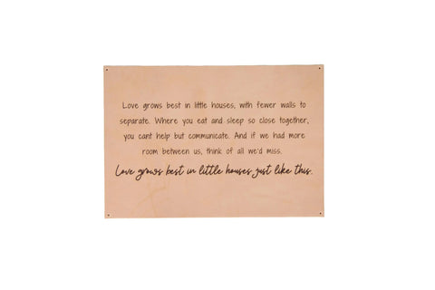 The Urban Southern Love Grows Best Leather Sign is a beige engraved piece featuring handwritten-style text: Love grows best in little houses, with fewer walls to separate… Perfect for adding rustic charm to your home decor.