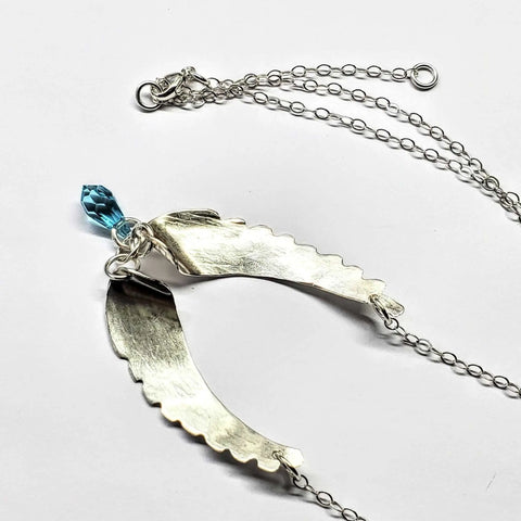 Handcrafted Silver Angel Wing Necklace With Blue Crystal Drop – Montana Forge | Made in USA Alexa Martha Designs  Necklace