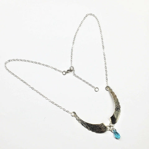 Handcrafted Silver Angel Wing Necklace With Blue Crystal Drop – Montana Forge | Made in USA Alexa Martha Designs  Necklace
