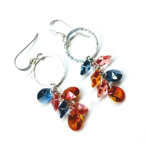 Alexa Martha Designs Silver Circle Multi Color Crystal Drop Dangle Earrings feature blue, orange, and pink faceted crystal teardrops on sterling silver, shown against a white background.