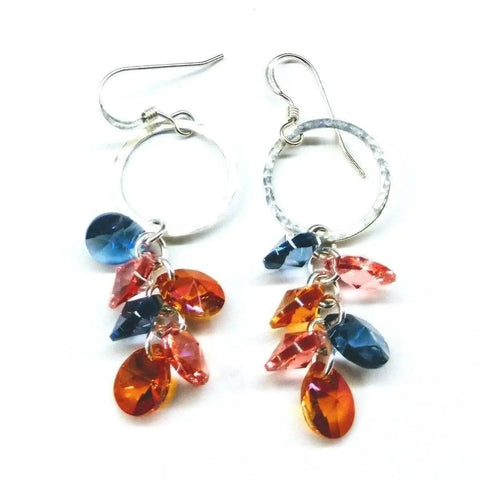 Alexa Martha Designs Silver Circle Multi Color Crystal Drop Dangle Earrings feature handmade sterling silver with blue, orange, and pink teardrop crystals on fishhooks, shown against a white background.