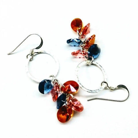 Alexa Martha Designs Silver Circle Multi Color Crystal Drop Dangle Earrings feature sterling silver hoops adorned with blue, orange, and pink crystal clusters, finished with hook-style ear wires for easy wear.