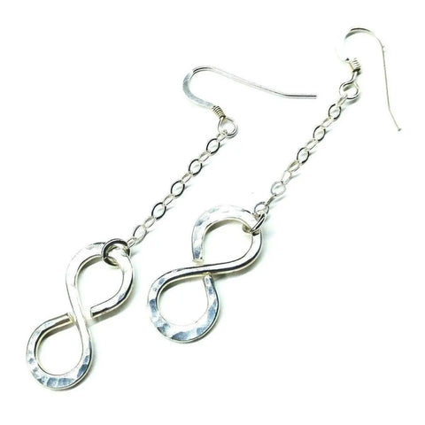 The Sterling Silver Hammer Patterned Infinity Earrings by Alexa Martha Designs feature hand-hammered infinity symbols on chain links with fishhook ear wires.