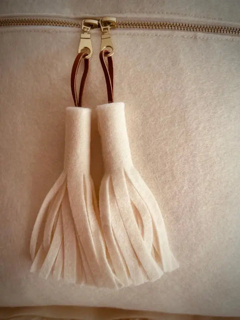 Handcrafted White Wool Throw Pillow – Leather Tassel Accent | Made in USA Suede Kloth 
