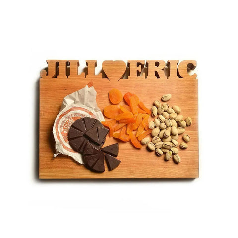 A small personalized cutting board that is perfect to give as a gift for a birthday, anniversary, or holiday present.
