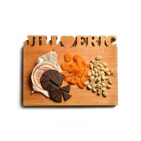 A small personalized cutting board that is perfect to give as a gift for a birthday, anniversary, or holiday present.