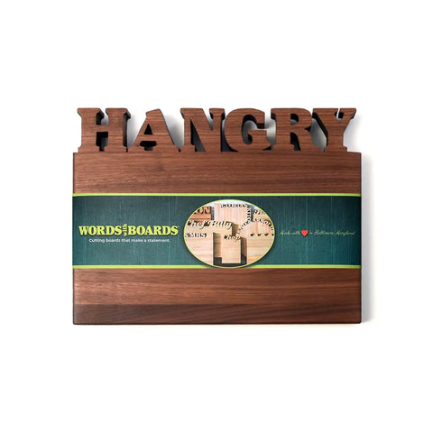 The Handcrafted Wooden Personalized Cutting Board (Small) by Words with Boards features HANGRY carved at the top, a green Words with Boards label, and a small illustration—making it a thoughtful, practical gift made in the USA.