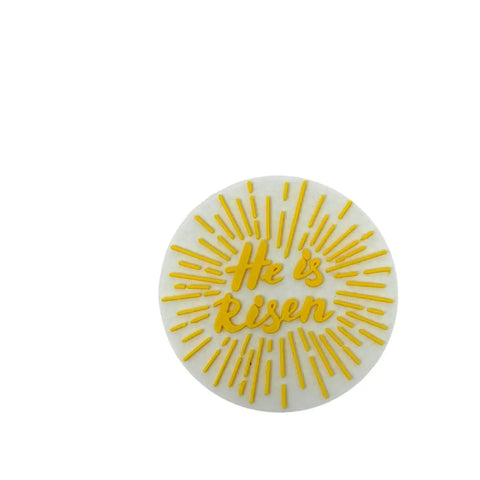 The He Is Risen Easter Decorative Fridge Magnet by Chatelet Manufacturing features yellow and white colors and rays of light—perfect for celebrating Jesus resurrection and adding festive Easter decor to your home. Made in the USA.