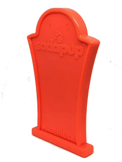 The Headstone Ultra Durable Nylon Dog Chew Toy by SodaPup is a red, tombstone-shaped chew toy made in the USA—ideal for aggressive chewers.