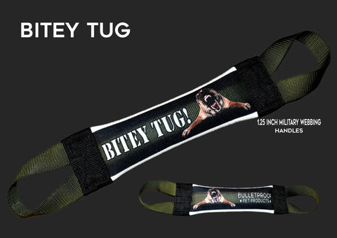 The Bitey Tug Fire Hose Training Tug by Bulletproof Pet Products Inc is a black and green dog toy with 1.25-inch military webbing handles, tough enough for play and training, shown on a dark background with a dog photo.