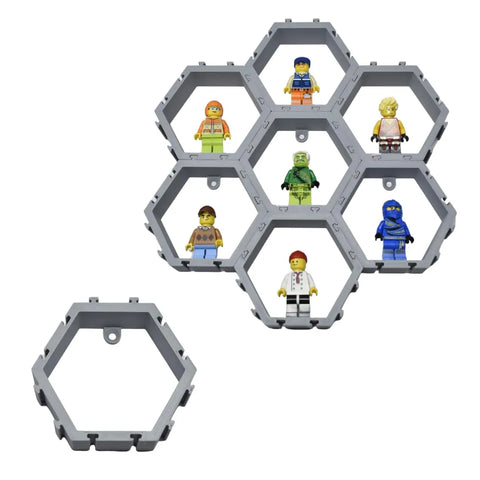 Chatelet Manufacturing’s Hexagon Wall Display features interlocking hex blocks arranged in a honeycomb pattern to display LEGO figures, with one extra empty hex beside the main set. Made in the USA and customizable for your collection.