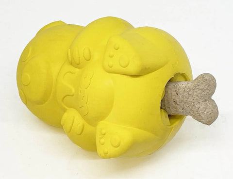 The SodaPup Honey Bear EDispenser is a durable, yellow natural rubber dog toy shaped like a bear that dispenses treats and withstands chewing.