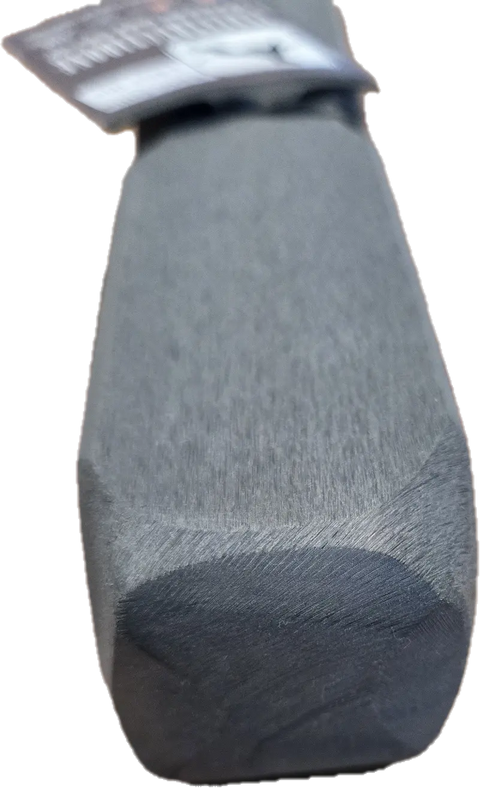 A close-up of a rectangular gift wrapped in smooth grey paper with a tag, perfect for presenting the Bulletproof Pet Products Inc Indestructibone Professional Epic Ollie Solid for Dogs 140lbs+ to your power chewer.