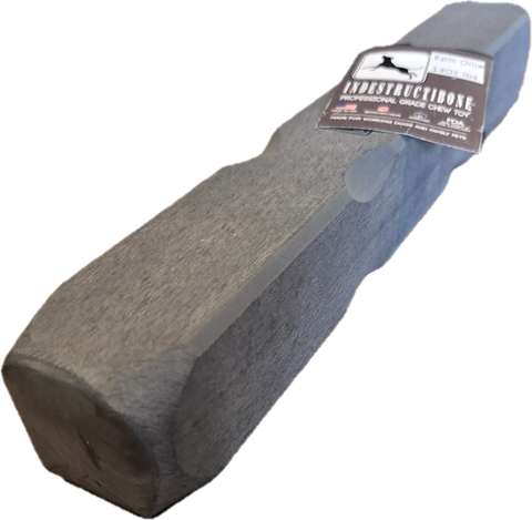 The Indestructibone Professional Epic Ollie Solid by Bulletproof Pet Products Inc is a large, gray, rectangular chew toy for dogs 140lbs+, featuring beveled edges and a rough texture—perfect for power chewers.