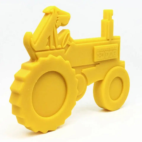 The SodaPup ID Tractor Ultra Durable Nylon Dog Chew Toy is a yellow, tractor-shaped toy with large wheels and a cartoon dog driver, designed for power chewers to help reduce problem behaviors.