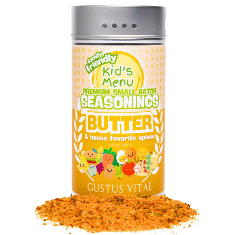 A tin of Gustus Vitae Kid’s Menu: Butter: And House Favorite Spices is shown with the lid on and seasoning sprinkled in front. Its colorful label features cartoon vegetables and promotes this all-natural, kid-friendly gourmet blend.