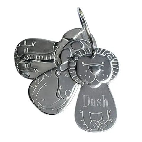 Kleynimals – Clean Key Animals® by Kleynimals: Stainless steel animal face pet tags, including a lion engraved with Dash, all attached to a keyring like sturdy toy keys.