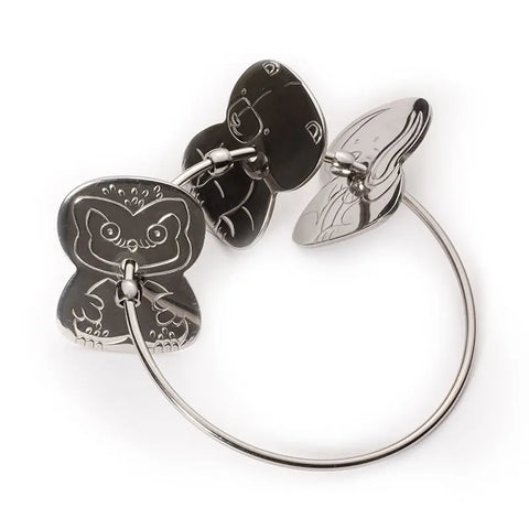 The Kleynimals Stainless Steel Rattle by Kleynimals features two engraved animal shapes—a kitten and a rabbit—connected by a curved handle. Its shiny, non-toxic surface makes this eco-friendly rattle a charming baby gift.