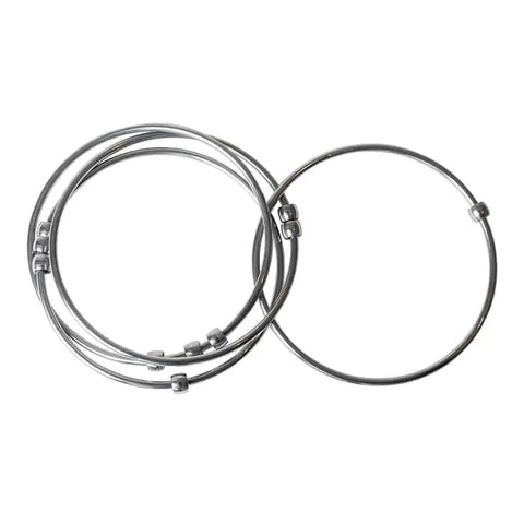 Three stainless steel rings from Kleynimals Jangles® by Kleynimals overlap on a white background, featuring a minimalist design that resembles a baby teether or fidget toy.