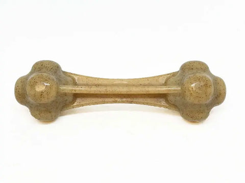 The SodaPup Knuckle Bone Ultra Durable Nylon Dog Chew Toy is a light brown, bone-shaped toy with rounded ends, made for tough play. Shown on a white background.