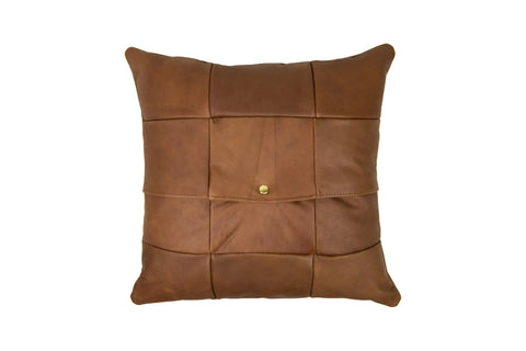 The Urban Southern Large Leather Pillow features a stitched patchwork design with a central button detail, shown against a white background.