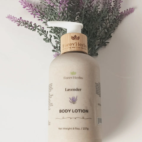 A bottle of Forev'Herbs Lavender Lotion with a pump sits before a lavender sprig on a white surface, featuring a label with natural ingredients, hydrating benefits, and delicate lavender illustrations.