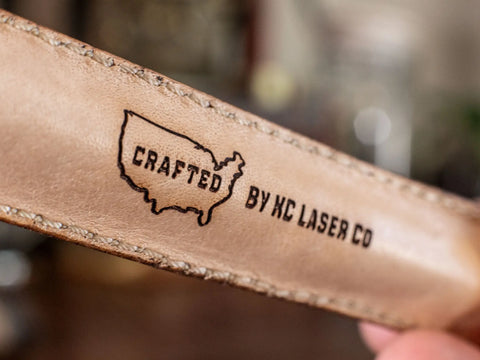 Close-up of the Leather Pen Sleeve for G2 Pens—handcrafted in the USA by KC Laser Co and Crafted, featuring a U.S. outline with CRAFTED and BY KC LASER CO. Visible stitching and texture; includes a free G2 pen.