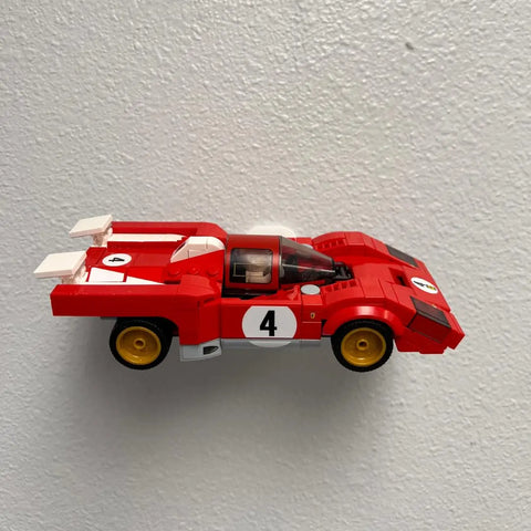 Showcase your LEGO Speed Champion Racecars in style with the Chatelet Manufacturing Collectible Wall Display. This side-profile mount, made in the USA, is perfect for displaying your cars on any wall.