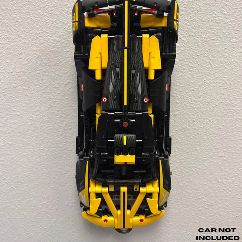 A Chatelet Manufacturing Collectible Car Wall Mount, compatible with LEGO Technic Lamborghini Huracán Tecnica 42161, displays the car vertically on a white wall; CAR NOT INCLUDED appears in the lower right corner.