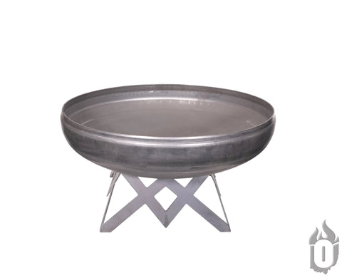 The Ohio Flame Liberty Fire Pit With Angled Base (Made in USA) features a large, round carbon steel basin on a crisscrossed metal stand. A flame logo appears in the lower right corner of the image.