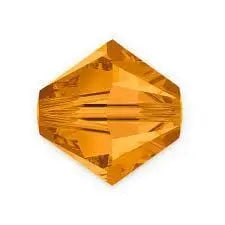 An orange faceted bicone crystal from Alexa Martha Designs shines against a white background, accenting the Memorial Birthstone Angelwing Necklace-Limited Special Edition 2020-2024.