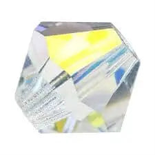 A close-up of a transparent, faceted crystal bead reflecting yellow and blue light, perfect for the Alexa Martha Designs Memorial Birthstone Angelwing Necklace-Limited Special Edition 2020-2024 to honor your loved ones.