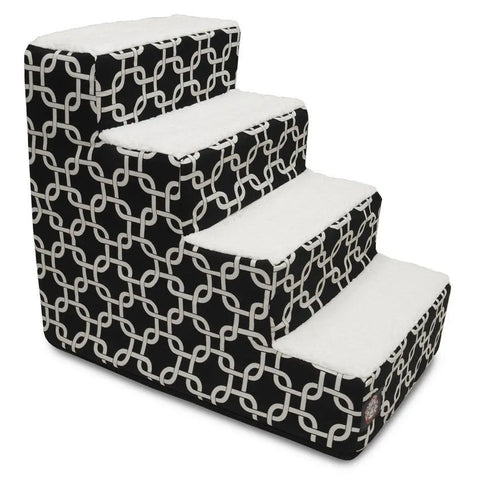 The Majestic Pet Links 4 Step Pet Stairs (Heavy-Duty) features black sides with a white geometric pattern and soft white Sherpa cushions on each step, providing a comfortable way for pets to reach higher surfaces.