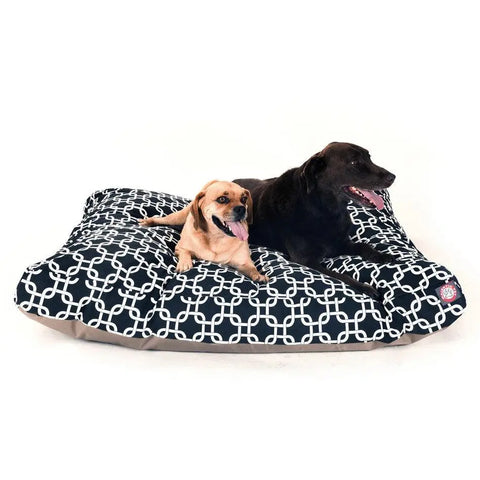 A small tan dog and a large dark brown dog relax together on the Majestic Pet Links Rectangle Dog Bed, featuring a black and white pattern. Both look comfortable enjoying this washable dog bed.