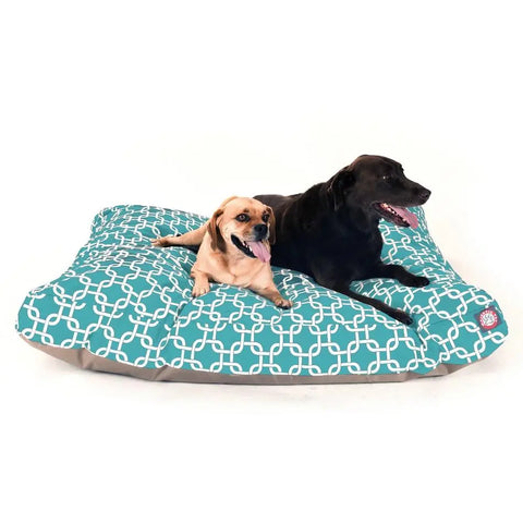 Two dogs, one light brown and one black, relax together on the Majestic Pet Links Rectangle Dog Bed, which features a white geometric pattern and premium polyester fiber fill for comfort.