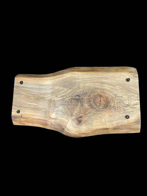 The B. James Design & Woodwork Live Edge Ambrosia Maple Serving Tray is a handcrafted rectangular tray featuring visible wood grain and four dark corner screws, shown on a black background.