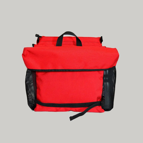 The Lone Peak Packs Lone Peak Recumbent Backpack Seat Pack is a bright red, water-resistant bag featuring black handles and mesh side pockets, shown against a plain light gray background.