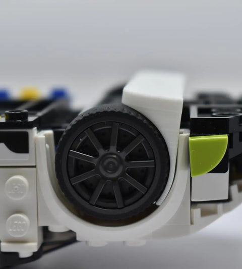 Showcase your LEGO car models with the Chatelet Manufacturing Low Profile Collectible Car Display Wall Mount (White)—designed to securely display cars by the wheel, compatible with LEGO models, and made in the USA.