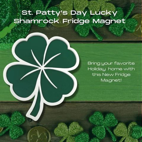 The Chatelet Manufacturing Saint Patricks Day Lucky Shamrock Fridge Magnet is shown on a wooden surface with festive green decor—a perfect four-leaf clover magnet for your Saint Patty’s Day celebrations, proudly made in the USA.