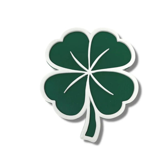 The Chatelet Manufacturing Saint Patricks Day Lucky Shamrock Fridge Magnet features a green four-leaf clover with a white outline—perfect for Saint Pattys Day celebrations or adding lucky decor to your fridge. Made in the USA.