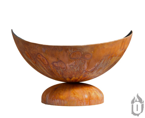 A large, rusted metal Lunar Fire Bowl by Ohio Flame (Made in USA) with a wide, curved shape sits on a rounded base against a white background. A small flame icon logo appears in the bottom right corner.