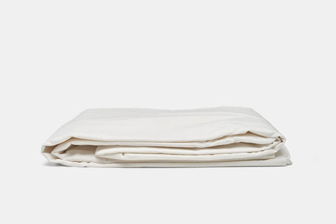 The Cotton Duvet Cover Set by American Blossom Linens, crafted with quality materials, is neatly folded and displayed against a plain white background.