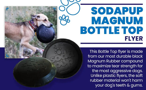 A tan dog runs outside carrying the SodaPup Magnum Bottle Top Flyer Ultra Durable Rubber Retrieving Frisbee (Large, Black)—a veterinarian-approved, natural rubber toy made with a magnum compound for enhanced durability and safety.
