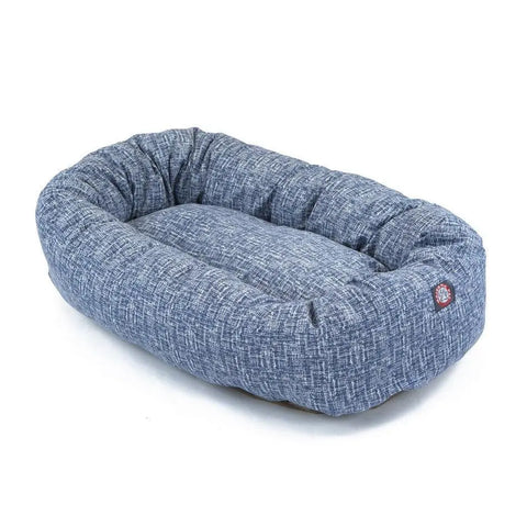 The Majestic Pet Palette Heathered Bagel Dog Bed is a rectangular, blue fabric bed with cushioned sides and a padded base for spinal support. Machine washable for easy cleaning. Shown on a white background.