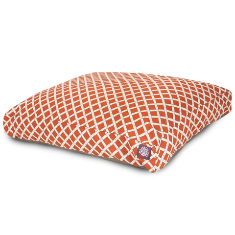 The Majestic Pet Bamboo Rectangle Dog Bed features an orange and white crisscross lattice pattern with a fabric tag on one side, offering a stylish and convenient washable bedding solution for your pet.