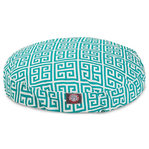 The Majestic Pet Towers Round Dog Bed features a teal and white Greek key design, soft cushioning, a sewn-on front label, and a removable cover for easy cleaning and maintenance.