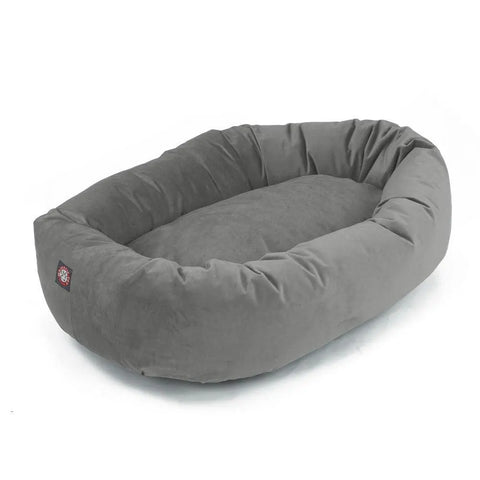 The Majestic Pet Velvet Bagel Dog Bed in large, oval-shaped gray features plush sides and a soft cushioned base for excellent spine support, shown on a white background.