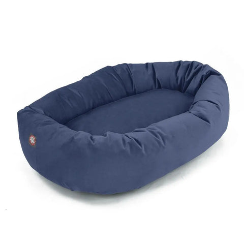 The Majestic Pet Poly/Cotton Bagel Dog Bed is a large, oval, navy blue bed with raised sides and a soft cushioned base, shown on a white background.