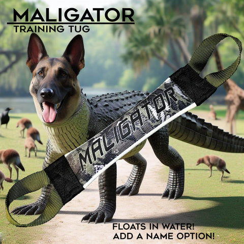 A creature with a German Shepherd head and alligator body stands in grass with birds. Up front, the Maligator Fire Hose Training Tug - Camo Series by Bulletproof Pet Products Inc is shown. Made in USA! Add your pet’s name!.